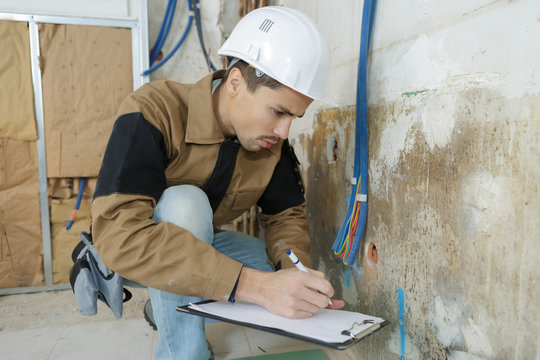 Plumber With Plumbing Tools