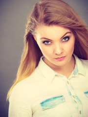 Attractive blonde woman with windblown hair