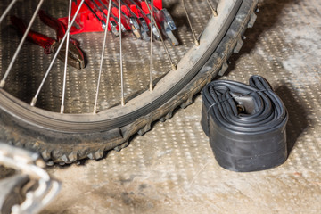 Mountain bike with punctured flat tire. Concept of bad luck and unforeseen