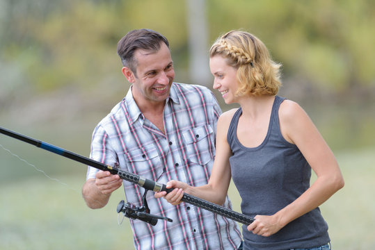 woman learning to fish