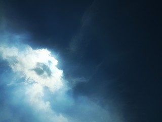 Naklejka na ściany i meble depp blue sky and abstract white cloud from sunlight under waving cloud