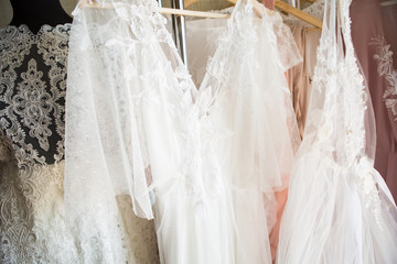 Fototapeta na wymiar Studio dress designer. Lace wedding dresses.