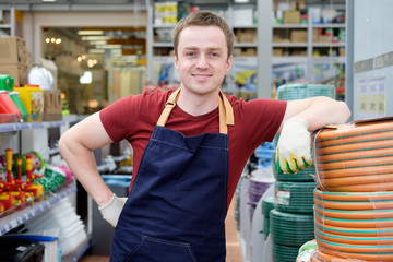 seller in building equipment tools store at work