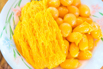  The set of Goldsmith's gems, Mock jackfruit seeds, Gold threads favorite sweet the popular Thai dessert.