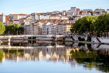 Fototapeta na wymiar Morning view on the old city with bridge and Rhone river in Lyon, France