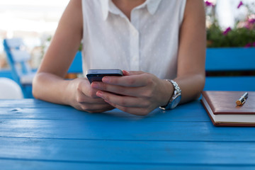 Young businesswoman using smartphone