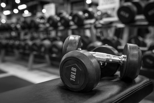 Black and white images dumbbell in the gym bodybuilding.