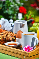 Breakfast served with coffee, juice, croissants and fruits