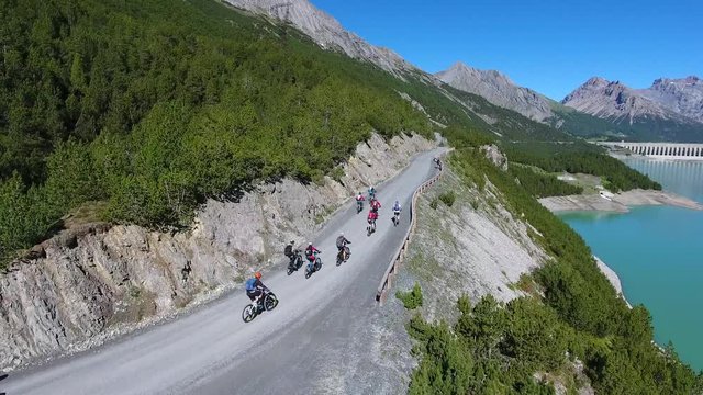 Bikers on mountain road - Sport in Valtellina - Lake of cancano