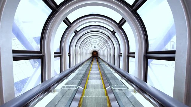 Futuristic tunnel escalator on the move
