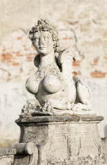 Fototapeta na wymiar Sphinx sculpture of the Baroque era, Villa Arconati, Lombardy, Italy