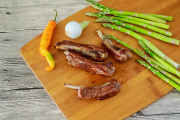 BBQ grilled ribs with vegetables
