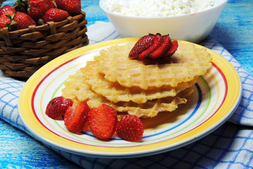 waffles and fruit, strawberries and cherries