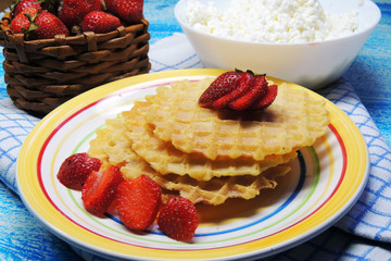 waffles and fruit, strawberries and cherries