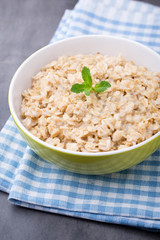 Oatmeal porridge with blueberries. healthy breakfast.