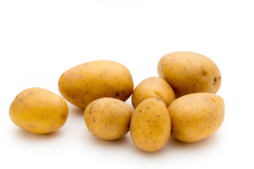 Raw potato isolated on white background.