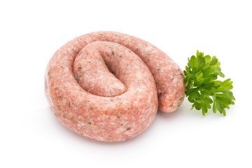Raw sausages with herbs and spices.