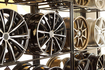 Car alloy wheels on shelf