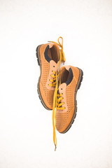 shoes hanging on the wall