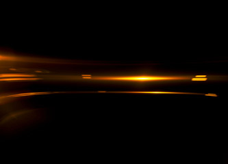Fototapeta na wymiar Beautiful light flares. Glowing streaks on dark background. Luminous abstract sparkling lined background. .light effect wallpaper. Sci fi technology. Sequins backdrop. New gala. .