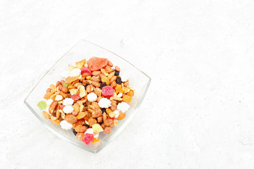 Nuts set in bowl, pistachios, cashews, hazelnuts, peanuts, Brazil nuts, walnuts, vintage wooden background, focus vyboronchy