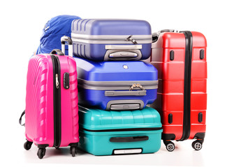 Suitcases and rucksacks isolated on white