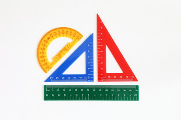 Colorful school tools : triangle, ruler, protractor