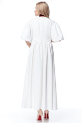 Beautiful elegant pregnant woman blond hair wear style fashion dress for mother hold in hand tummy wait for baby child new born pretty lady clothes for pregnancy white background collection heath.