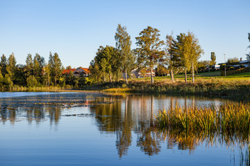 A traditional cottage stands by the lakeside in Hedemora, Sweden