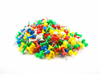 Group of colorful pins on white background