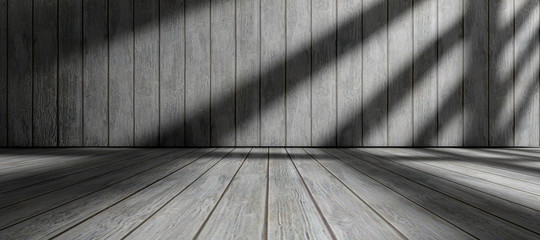 Fondo de arquitectura.Interior de casa.Habitación vacia con suelo de madera y pared de madera.Luz del sol entrando por la ventana. © C.Castilla