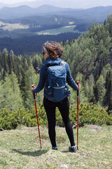 Young woman hiking in mountain