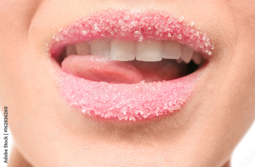 Wall mural woman with sugar lips, closeup