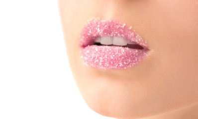 Woman with sugar lips on white background, closeup