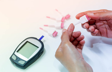 woman monitor blood glucose levels