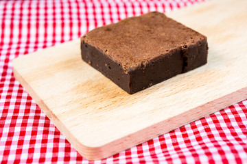 Chocolate Brownie cake on a dark plate