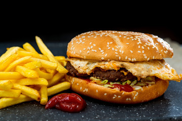 Cheese burger - American cheese burger with Golden French fries