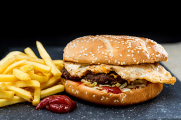 Cheese burger - American cheese burger with Golden French fries
