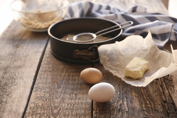 Ingredients for cheese cake on kitchen table