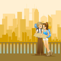 Young couple of backpackers planning the route and looking at map