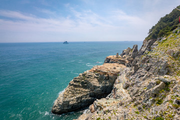 Fototapeta na wymiar Taejongdae cliff and sea in Busan, Korea - seascape
