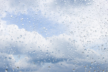Fototapeta na wymiar Raindrops on the glass
