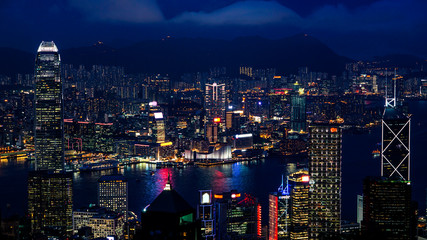 Hong Kong iconic night view from Victoria peak, Beautiful light illuminate skyscraper