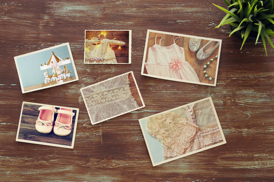 top view of photos collage on wooden background