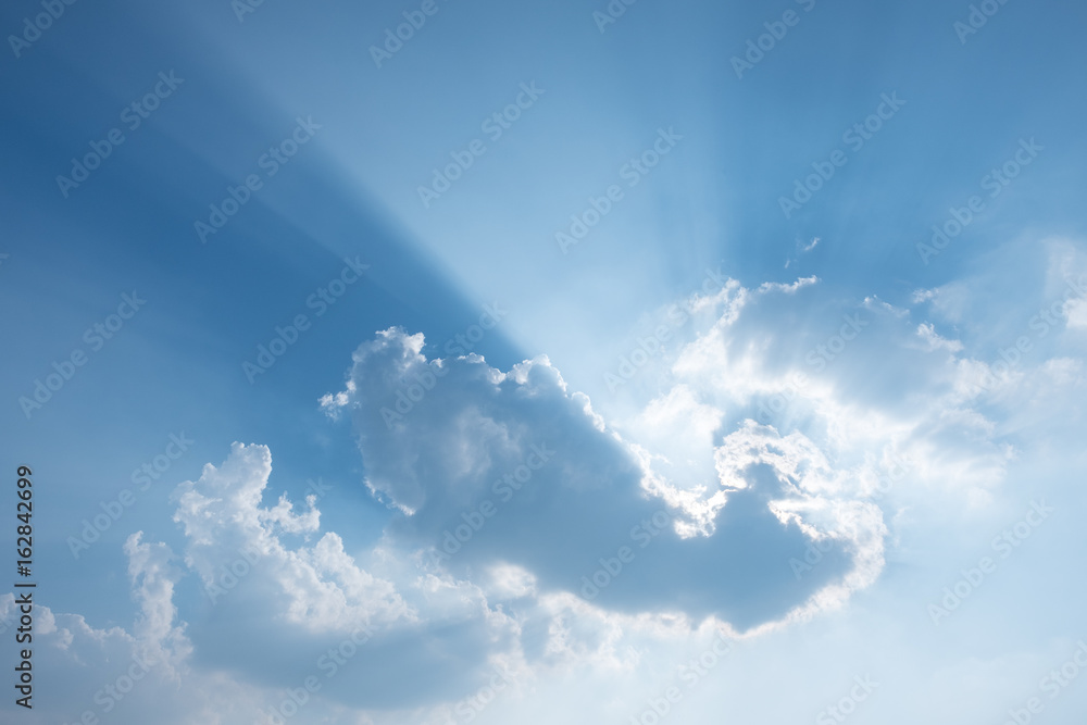 Canvas Prints sun rays behind cloudy