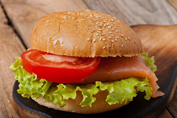 Fish sandwich with tomato and salted fish.