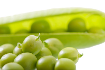 Sweet green peas isolated on white background.
