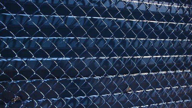 Blue metal fence with wire