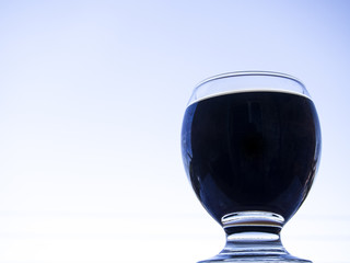A glass of cola on sky