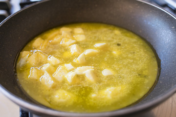 making at home an omelette in pan